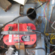 Illustration for article titled Junked BMW E30s Provide Cheap, Easy Way To Trunk-Mount Your Battery